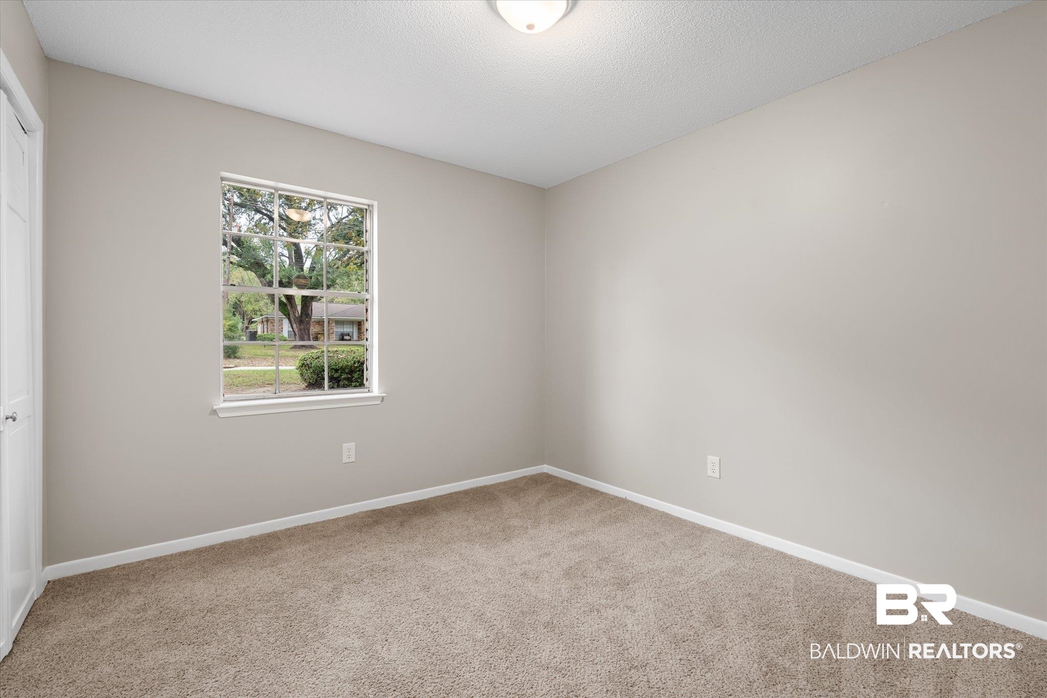 5015 Golfway Drive Eight Mile, AL 36613 - Photo 21 of 31 View of carpeted spare room