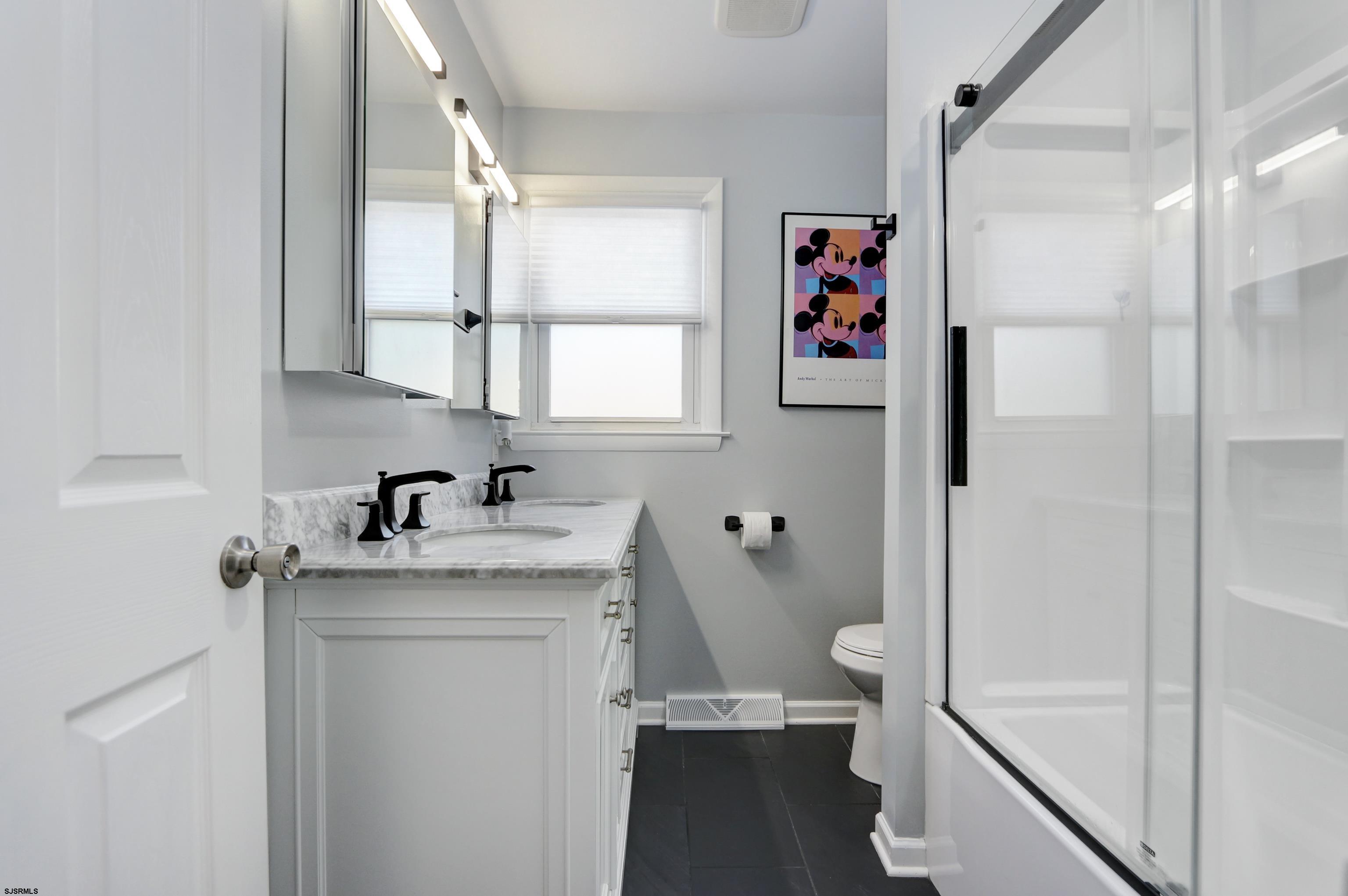 226 Ridgewood Drive Northfield, NJ 08225 - Photo 13 of 41 a very nice looking room with a shower and a sink