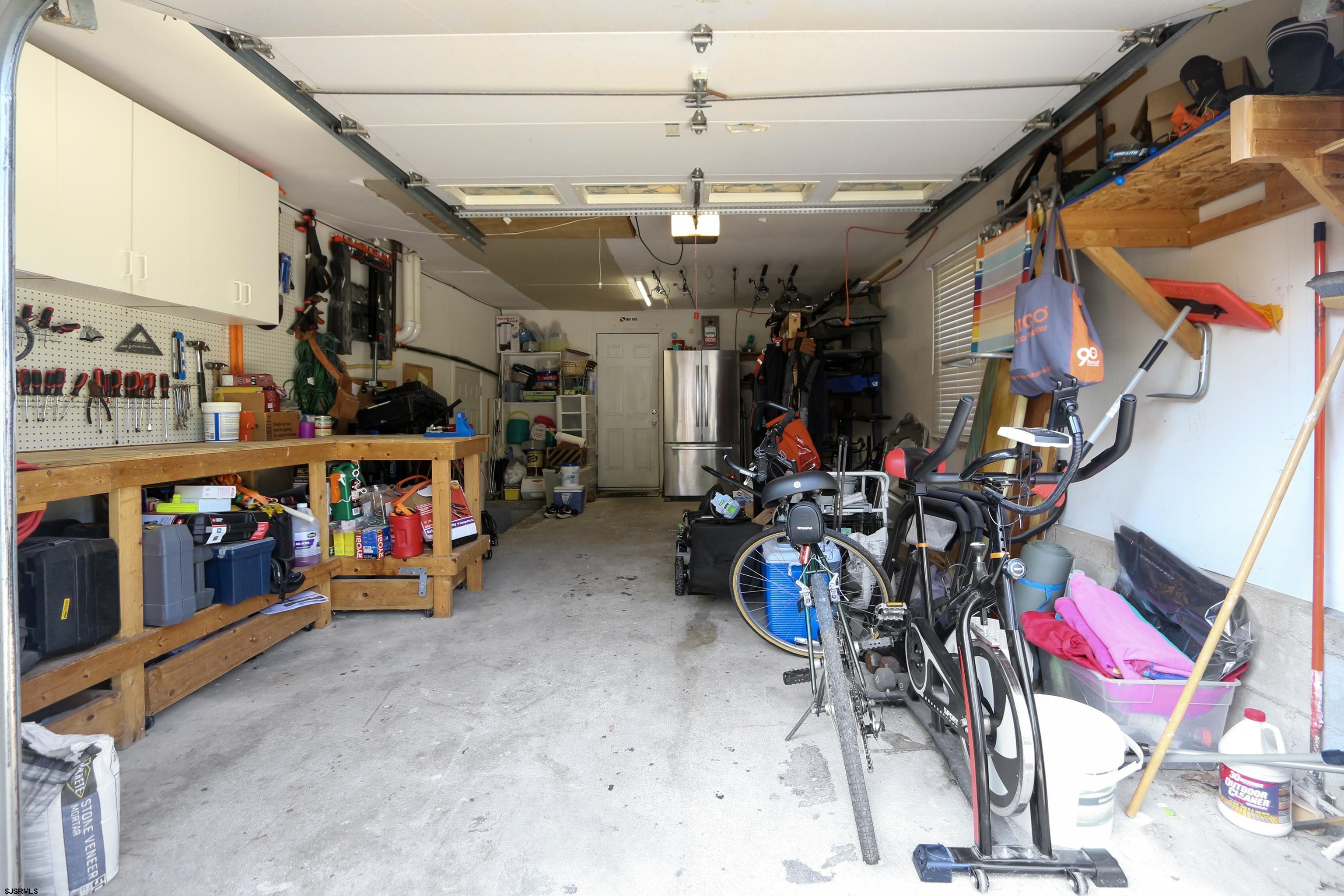 226 Ridgewood Drive Northfield, NJ 08225 - Photo 27 of 41 a view of a storage room with a lot of stuff