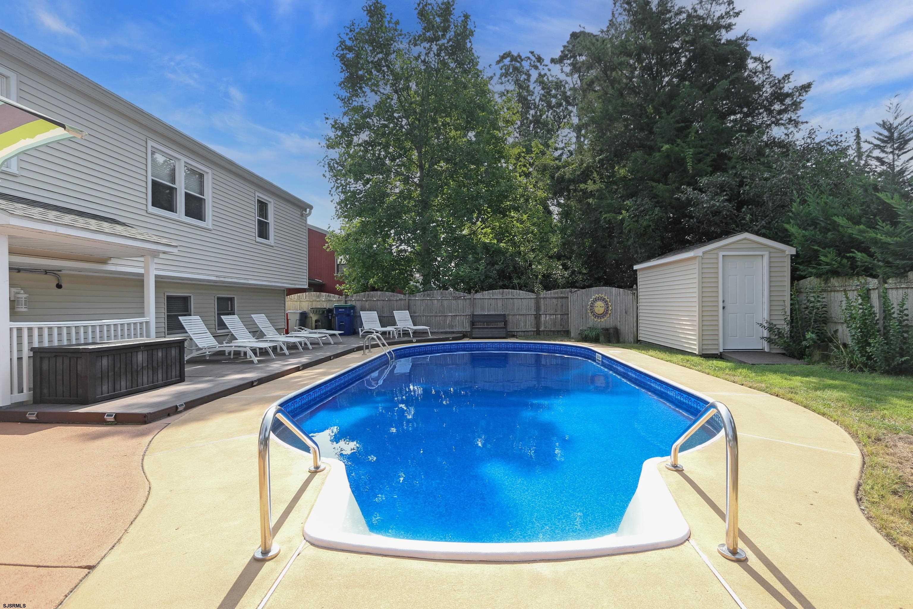 226 Ridgewood Drive Northfield, NJ 08225 - Photo 38 of 41 a view of outdoor space and swimming pool