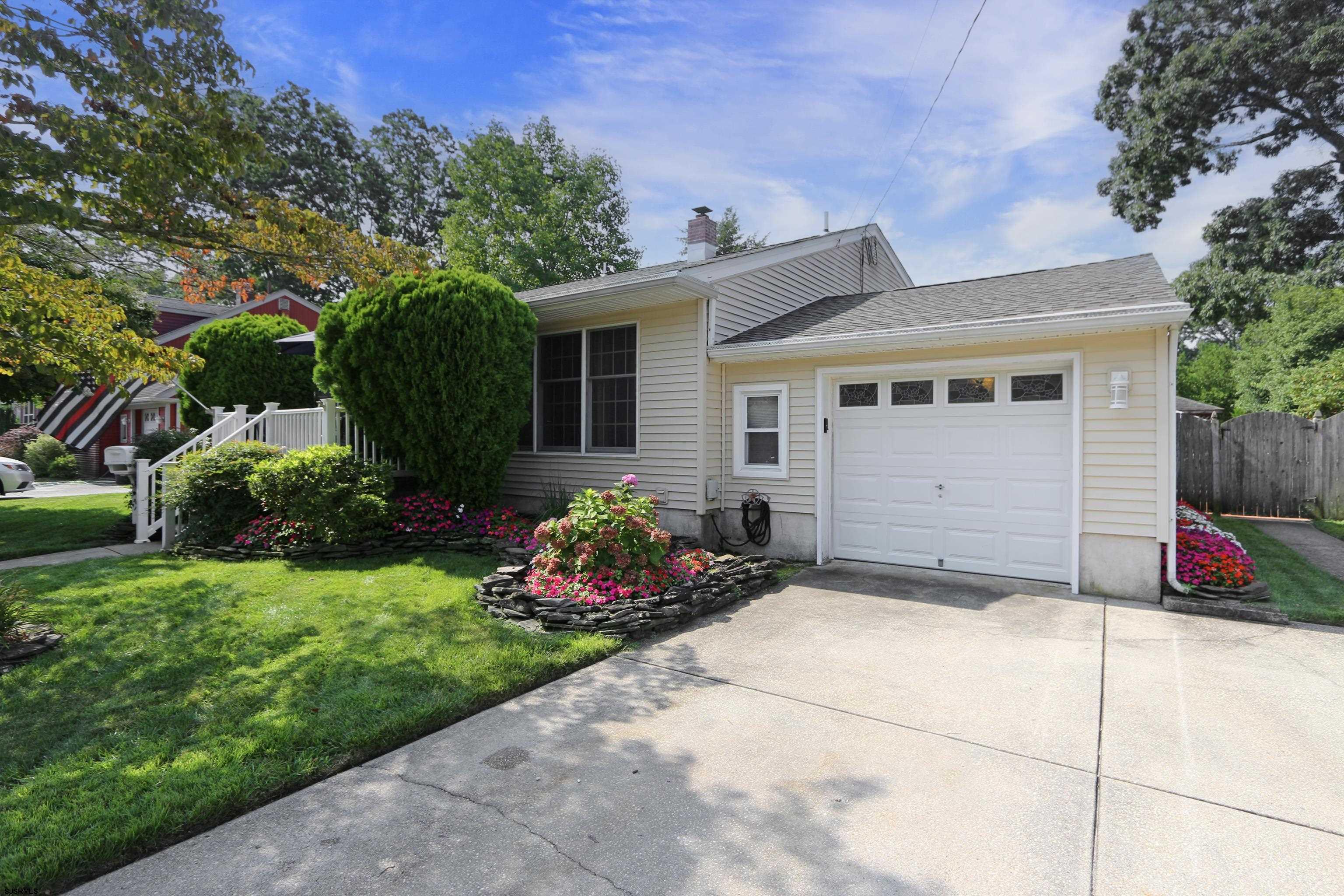 226 Ridgewood Drive Northfield, NJ 08225 - Photo 39 of 41 a house view with a garden space