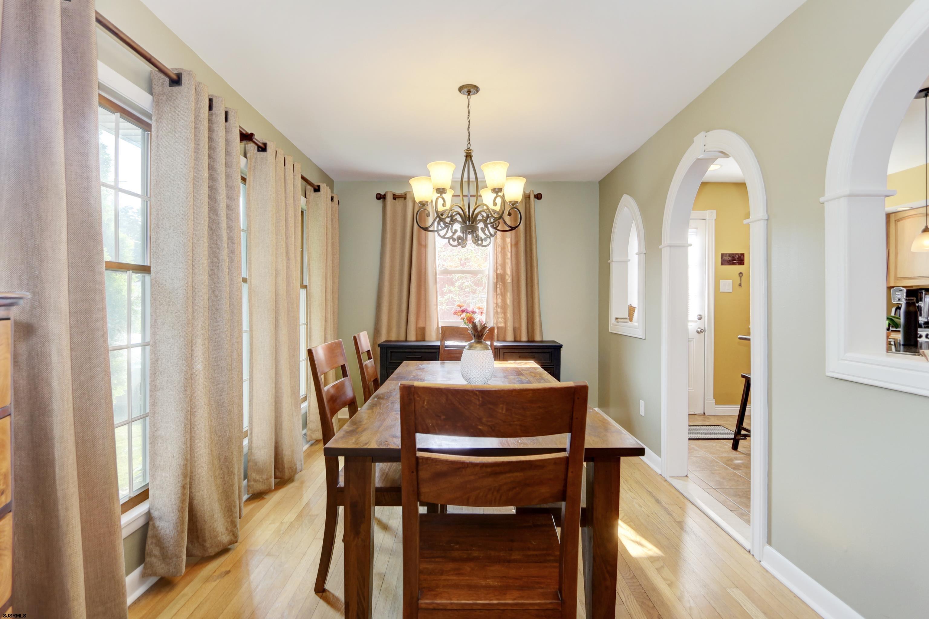 226 Ridgewood Drive Northfield, NJ 08225 - Photo 8 of 41 a view of a dining room with furniture and window