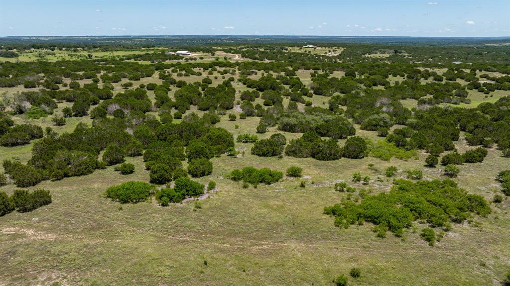 Tbd Tbd Mesa Ridge Road Hamilton, TX 76531 - Photo 13 of 28 an aerial view of residential houses with outdoor space and trees all around