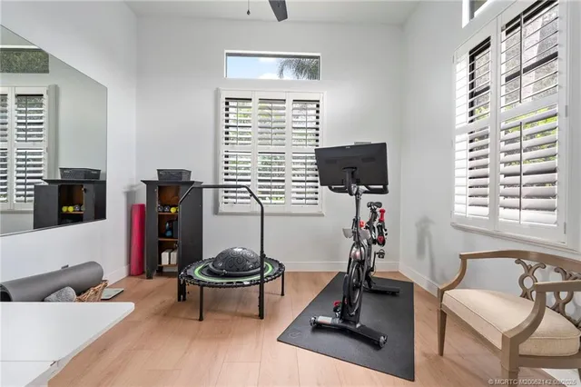 a view of a walk in closet and bathroom