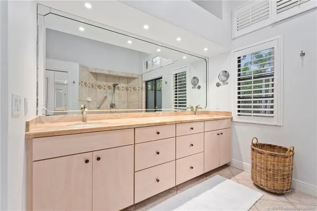 a view of a porch with furniture and a yard