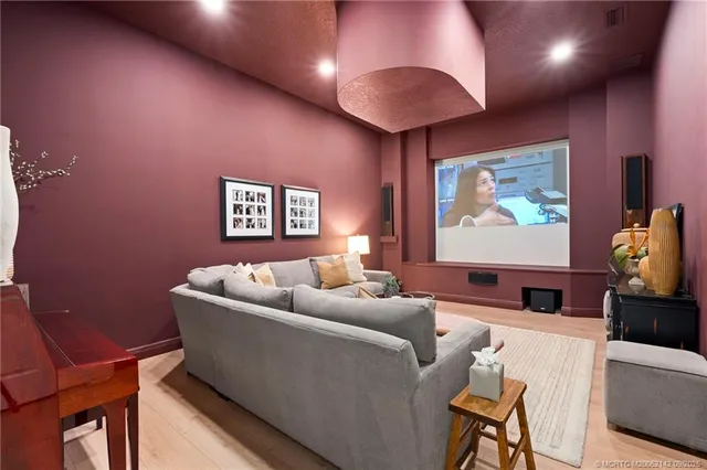 an aerial view of a house with garden space and street view