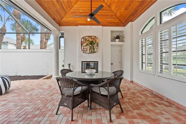 an aerial view of a house with a lake view