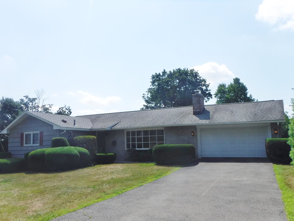 40 Bemis Road Holyoke, MA 01040 - Photo 2 of 29 a front view of a house with a yard and garage