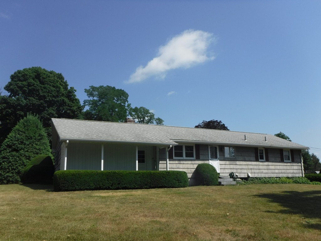 40 Bemis Road Holyoke, MA 01040 - Photo 29 of 29 a front view of a house with a garden and yard