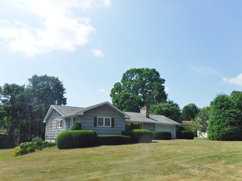 40 Bemis Road Holyoke, MA 01040 - Photo 3 of 29 a front view of a house with a garden
