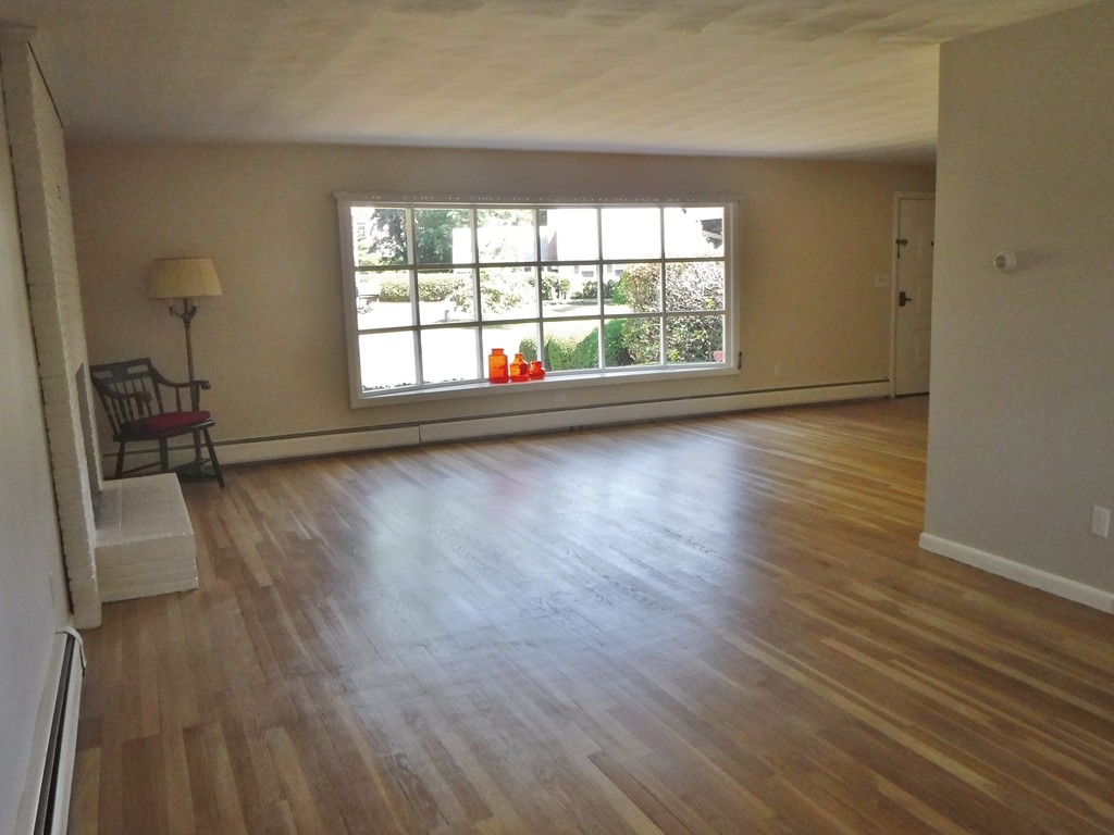 40 Bemis Road Holyoke, MA 01040 - Photo 7 of 29 wooden floor in an empty room with a window