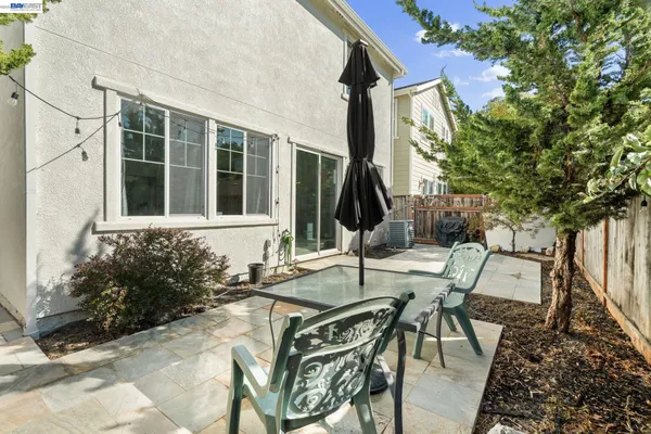 a view of a park with swings and slides