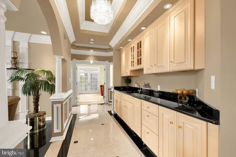 a large kitchen with granite countertop lots of counter top space
