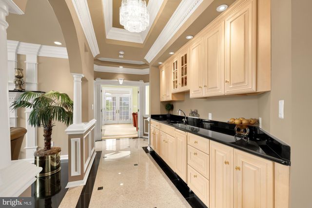 a large kitchen with granite countertop lots of counter top space