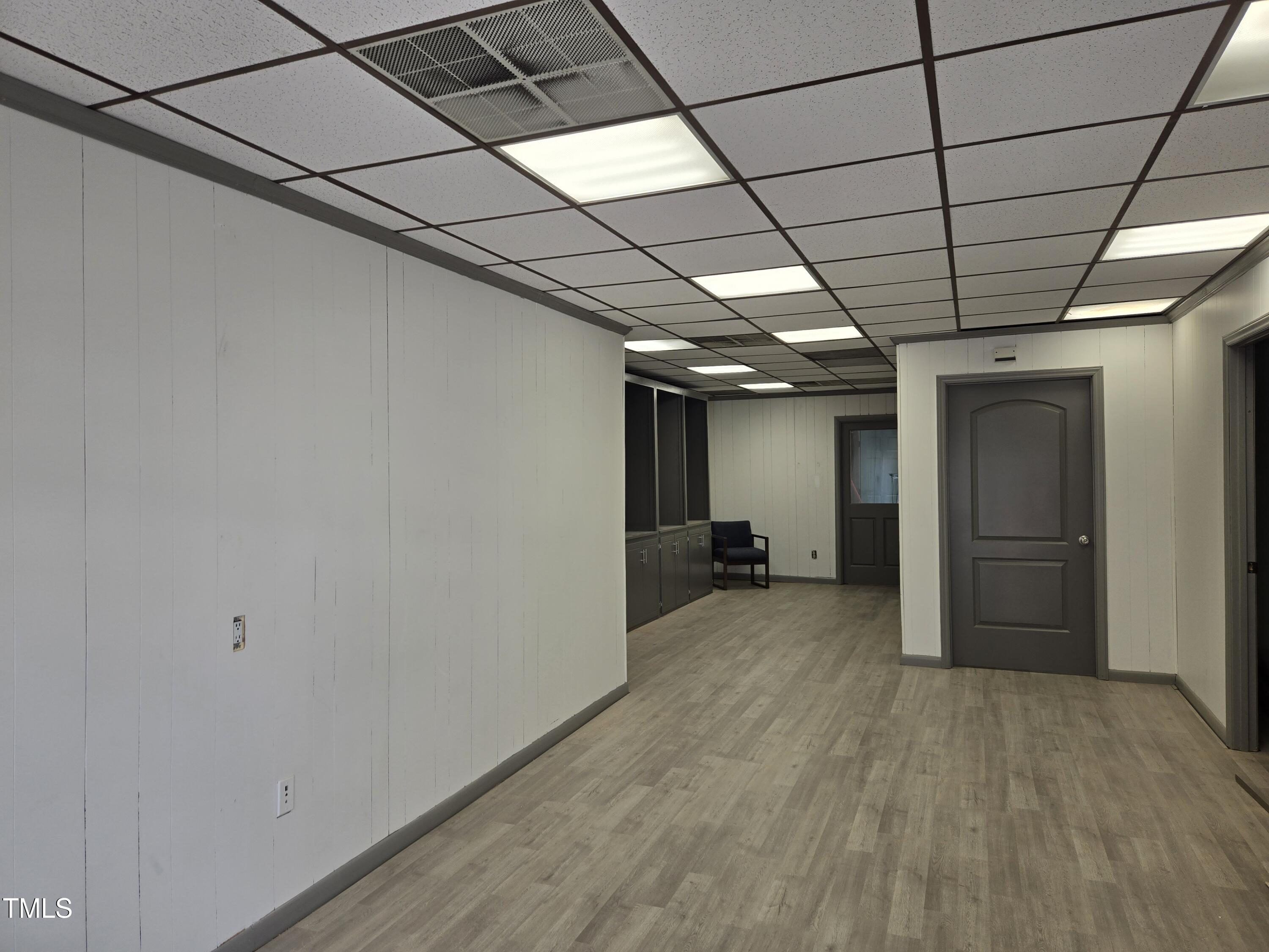 116 East Main Street Durham, NC 27701 - Photo 3 of 15 a view of a room with wooden walls