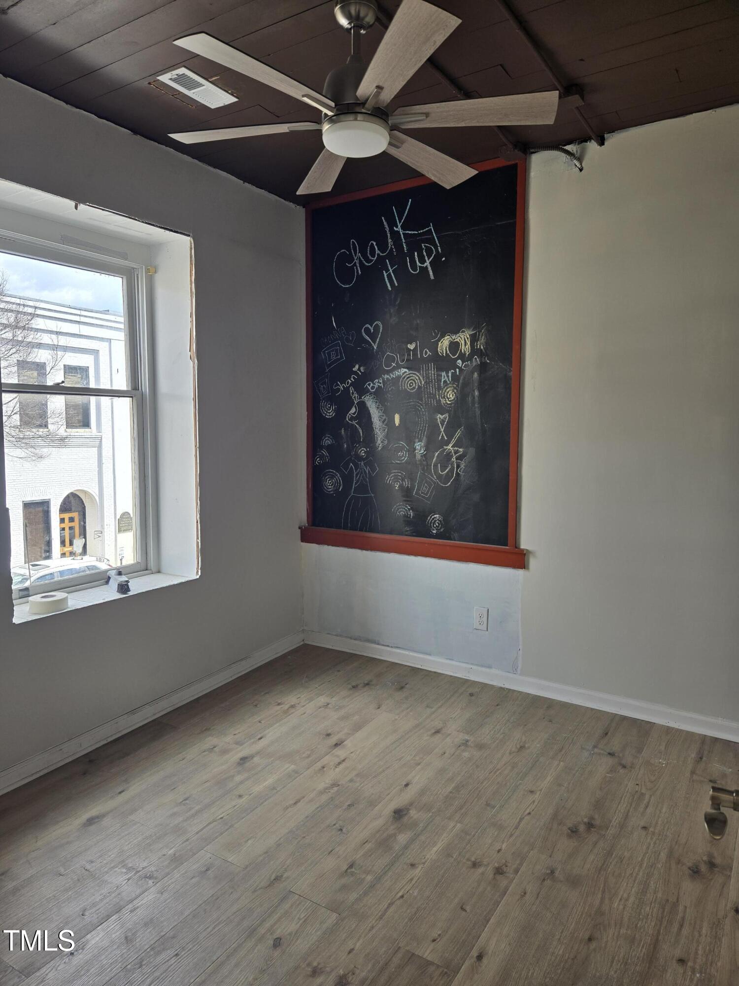 116 East Main Street Durham, NC 27701 - Photo 7 of 15 an empty room with windows
