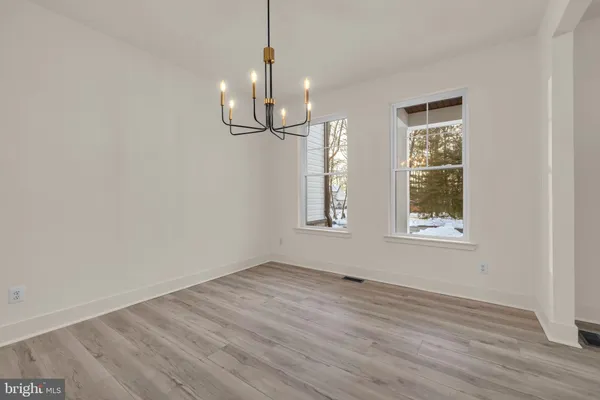 a kitchen with a sink stove and refrigerator