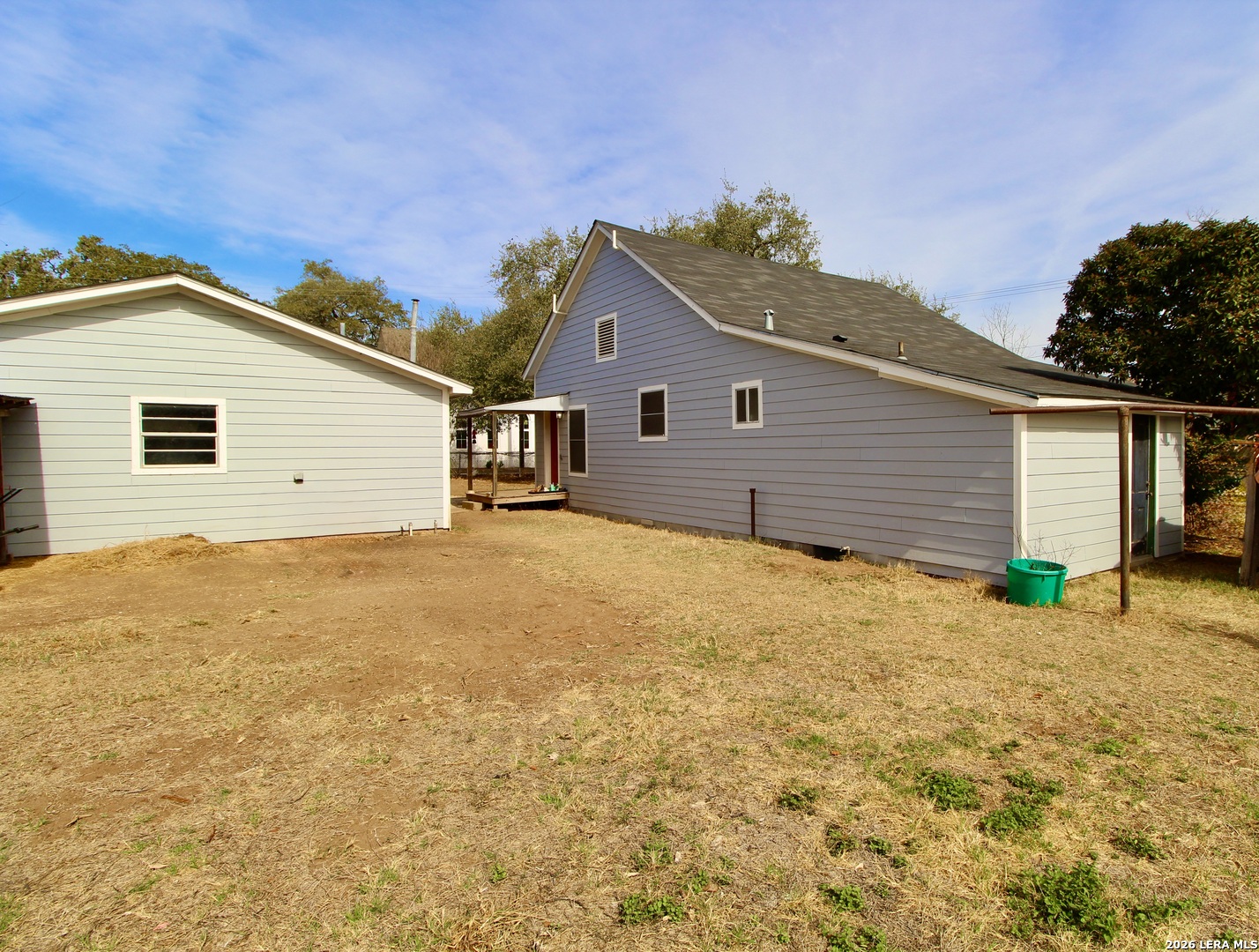 19231 Benton Lytle, TX 78052 - Photo 11 of 34 a view of a house with a yard