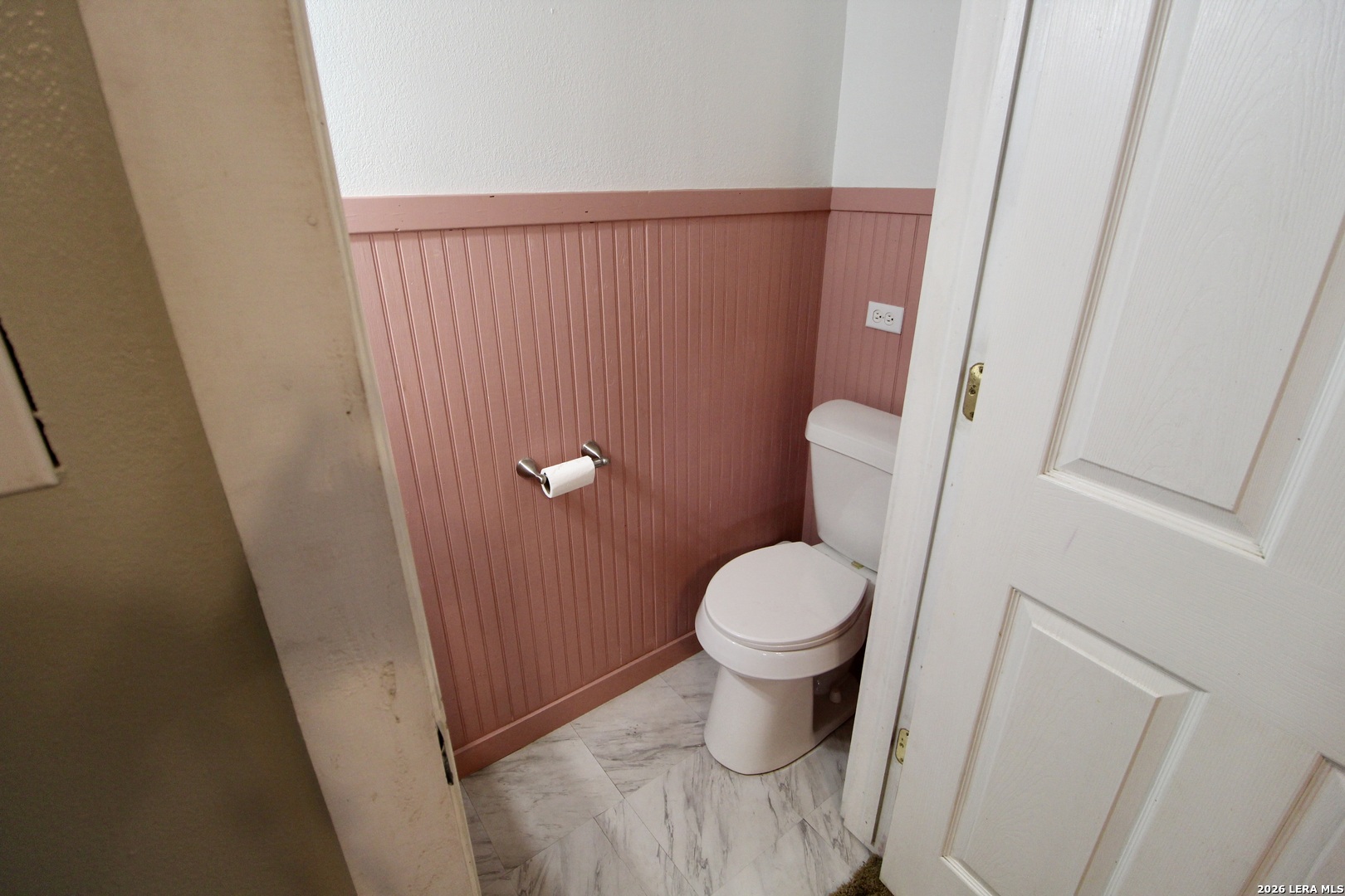 19231 Benton Lytle, TX 78052 - Photo 19 of 34 a white toilet sitting next to a sink