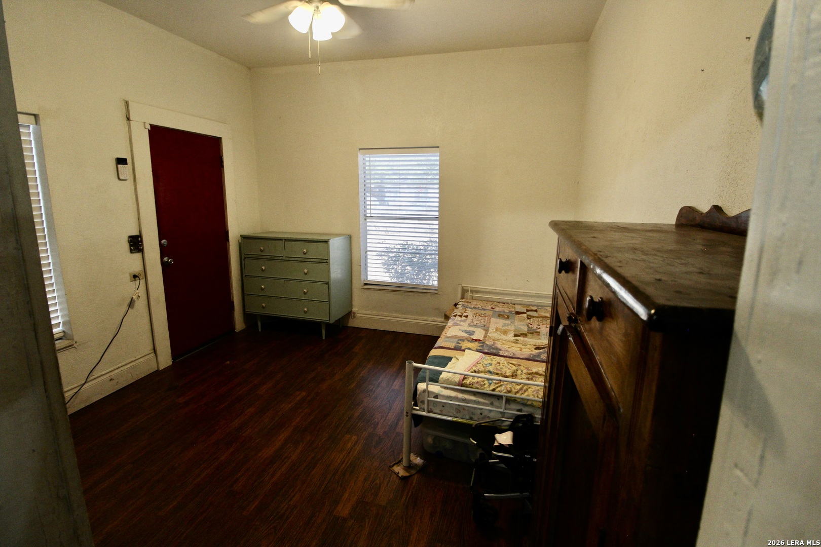 19231 Benton Lytle, TX 78052 - Photo 26 of 34 a view of room with cabinets and wooden floor
