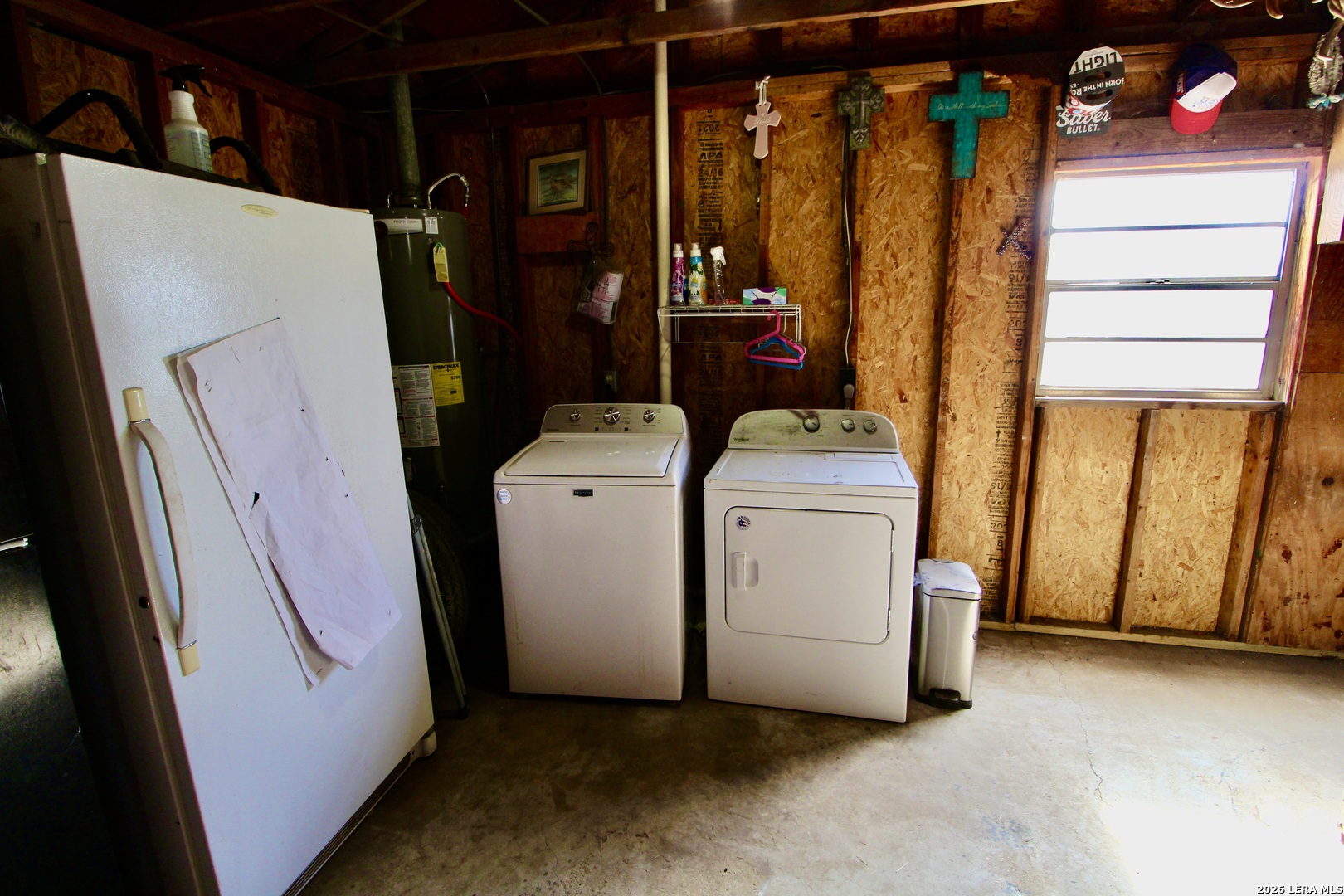 19231 Benton Lytle, TX 78052 - Photo 33 of 34 a utility room with dryer and washer