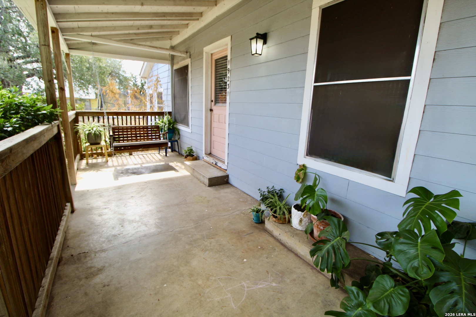 19231 Benton Lytle, TX 78052 - Photo 7 of 34 a view of a house with a backyard and porch