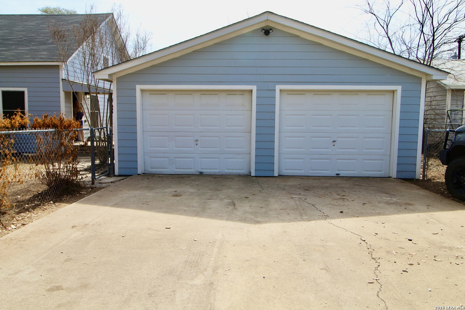 19231 Benton Lytle, TX 78052 - Photo 8 of 34 a view of outdoor space and garage
