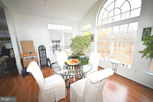 a bathroom with a sink vanity and a mirror