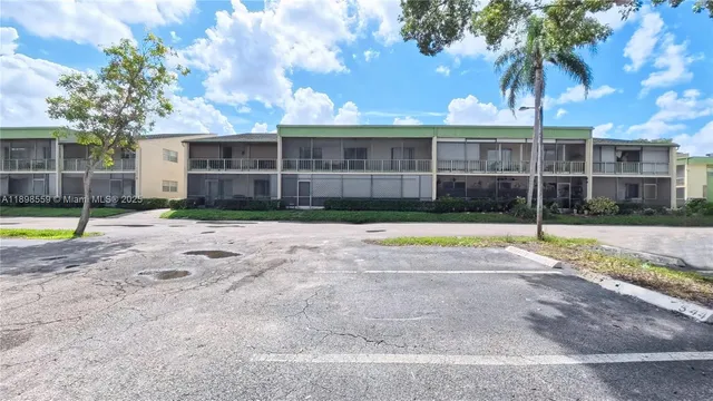 a view of a house with a swimming pool