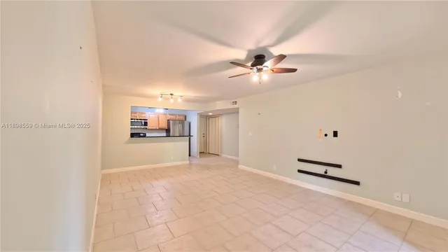 a view of a livingroom with a ceiling fan