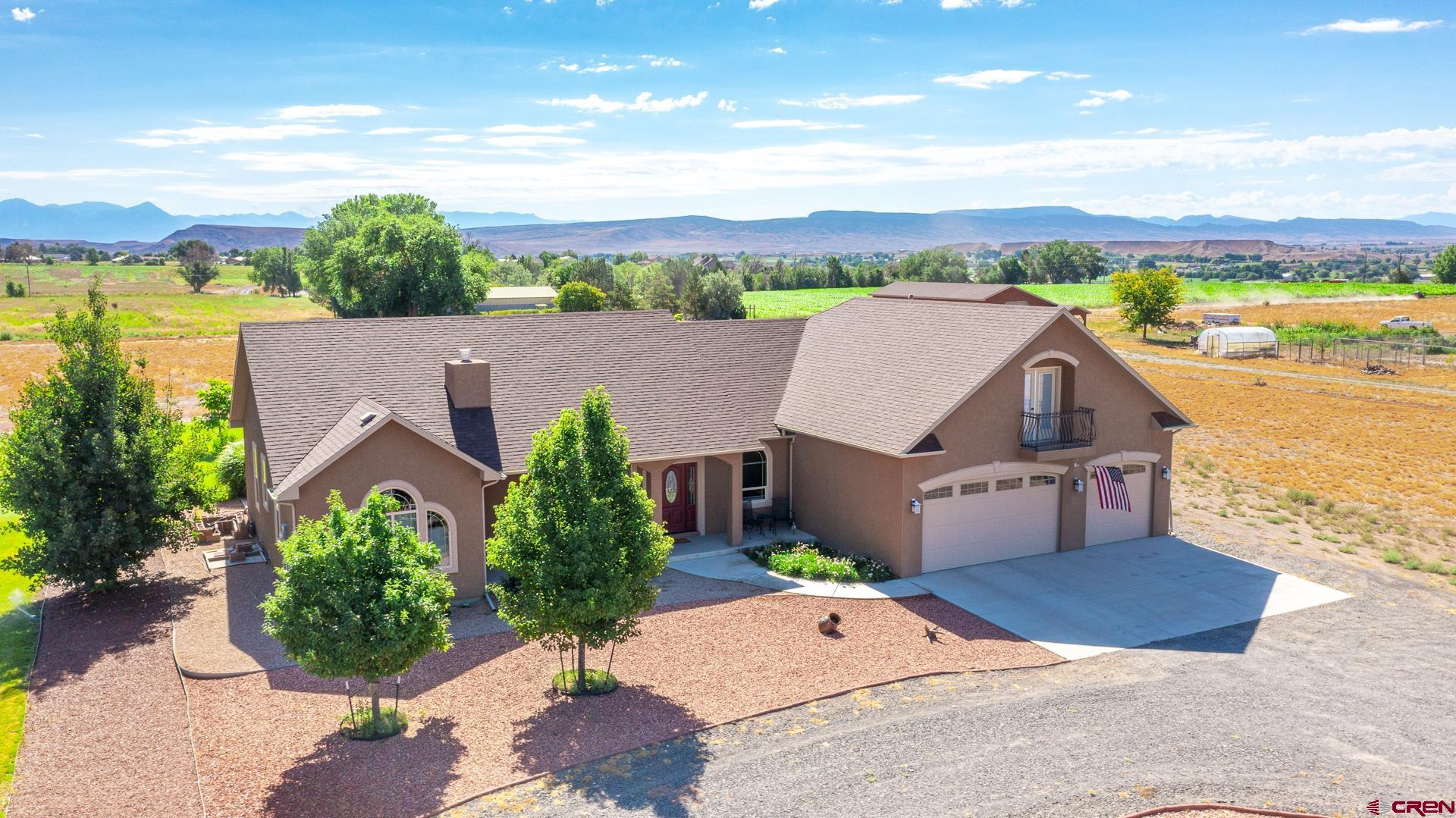 an aerial view of a house with a garden