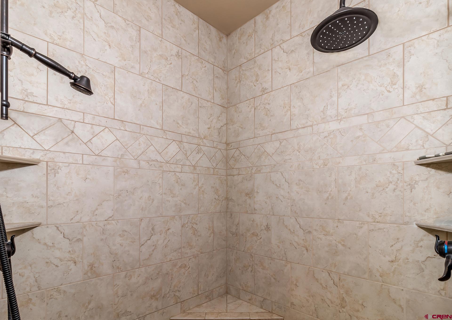 8460 1950th Road Austin, CO 81410 - Photo 15 of 35 a bathroom with a shower