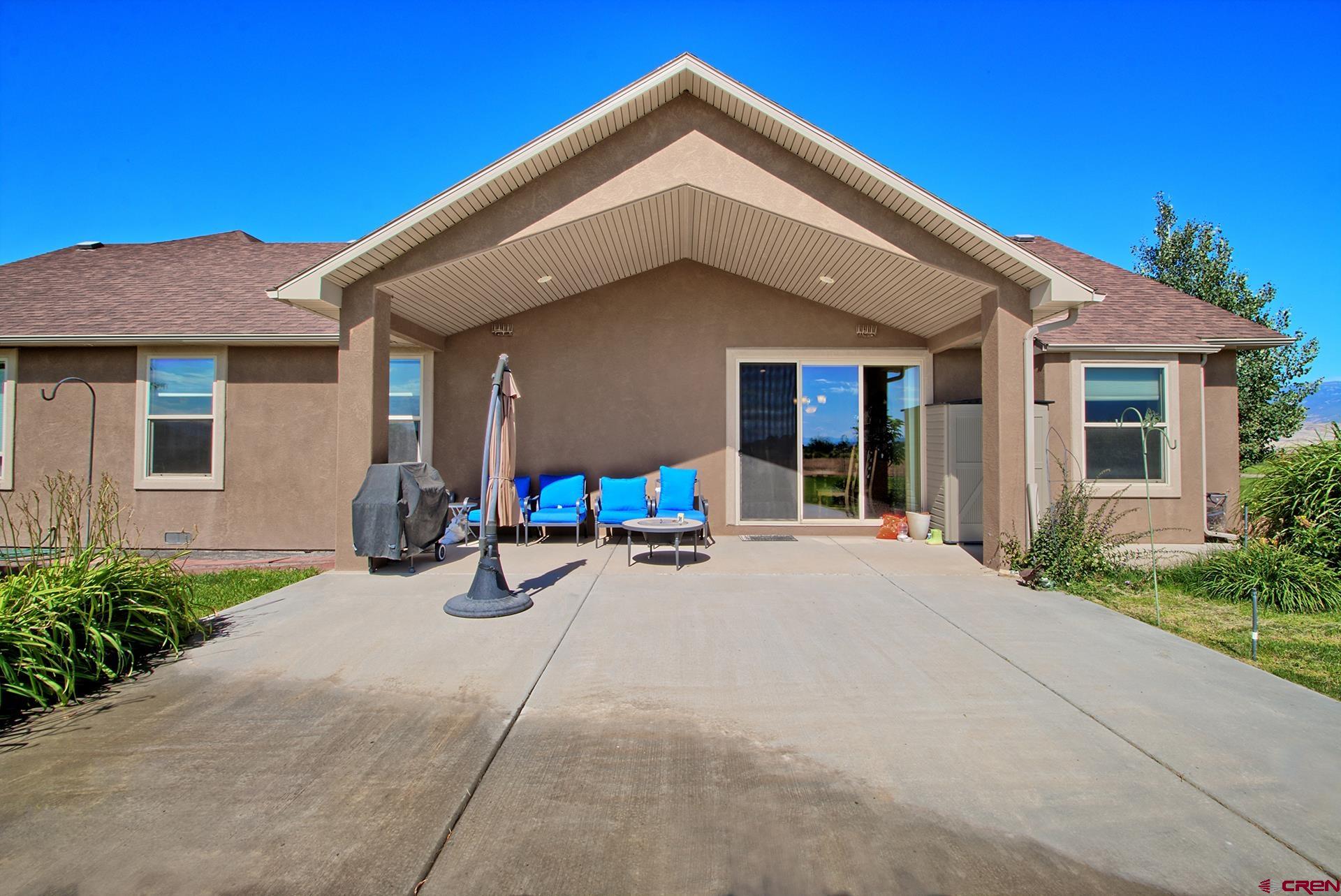 8460 1950th Road Austin, CO 81410 - Photo 24 of 35 a view of a house with patio