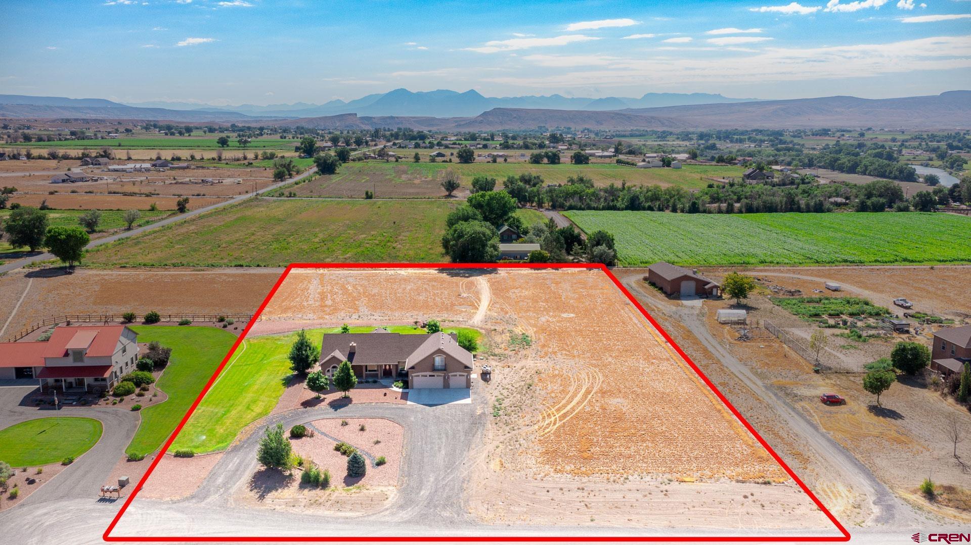 8460 1950th Road Austin, CO 81410 - Photo 28 of 35 an aerial view of a house with a garden