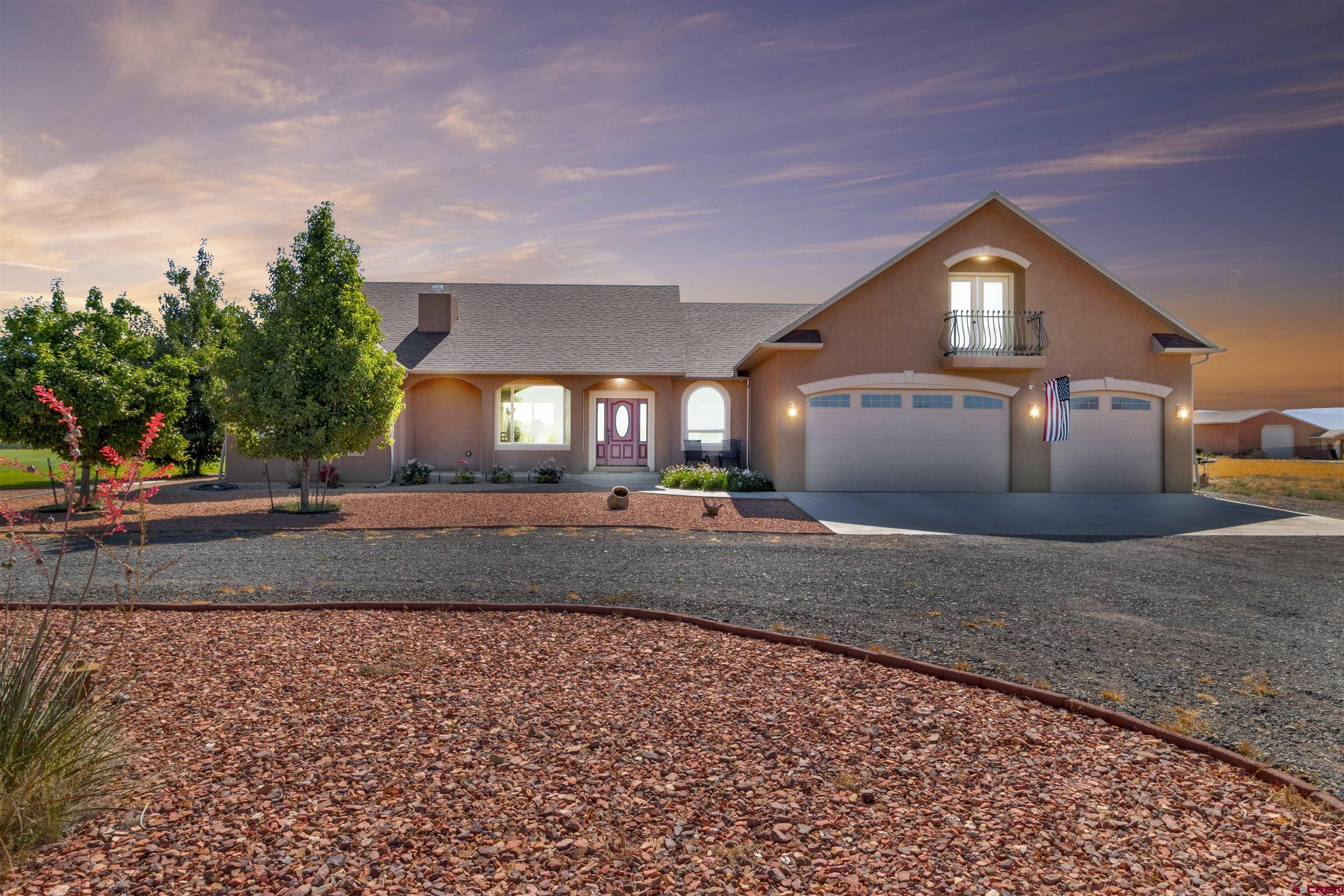 8460 1950th Road Austin, CO 81410 - Photo 35 of 35 a view of a house with a yard