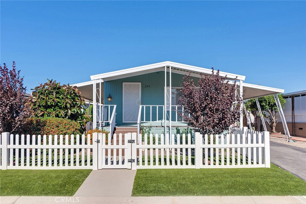 4000 Pierce, Unit 295 Riverside, CA 92505 - Photo 19 of 29 a front view of a house having yard