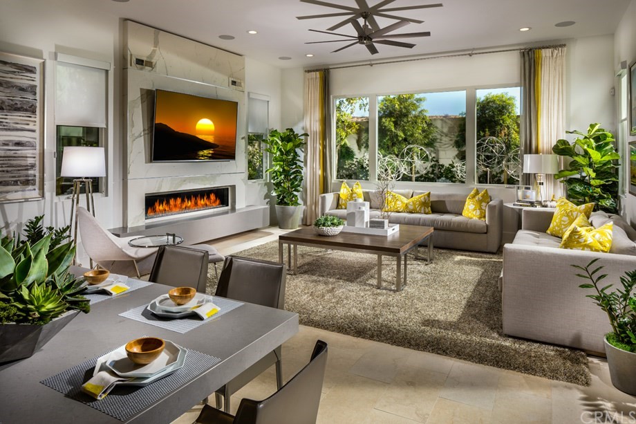 58 Gravity Irvine, CA 92618 - Photo 3 of 8 a living room with furniture and flat screen tv