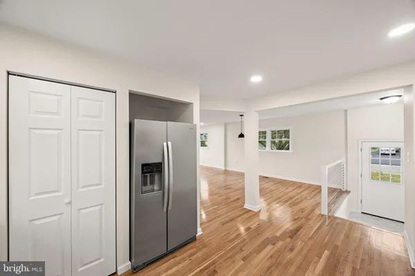 a view of a livingroom with wooden floor