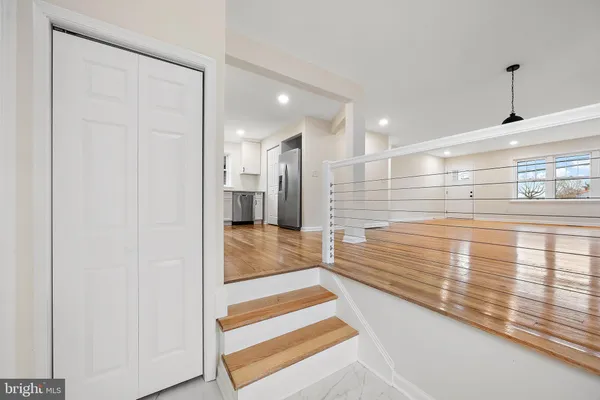 a spacious bathroom with a tub and shower