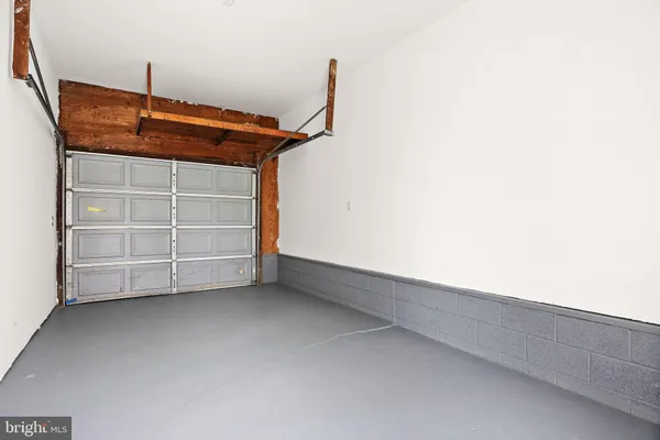 a view of house with backyard