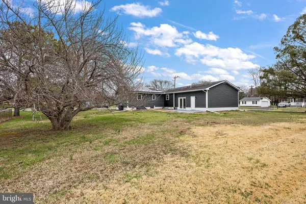 a view of a house with a big yard