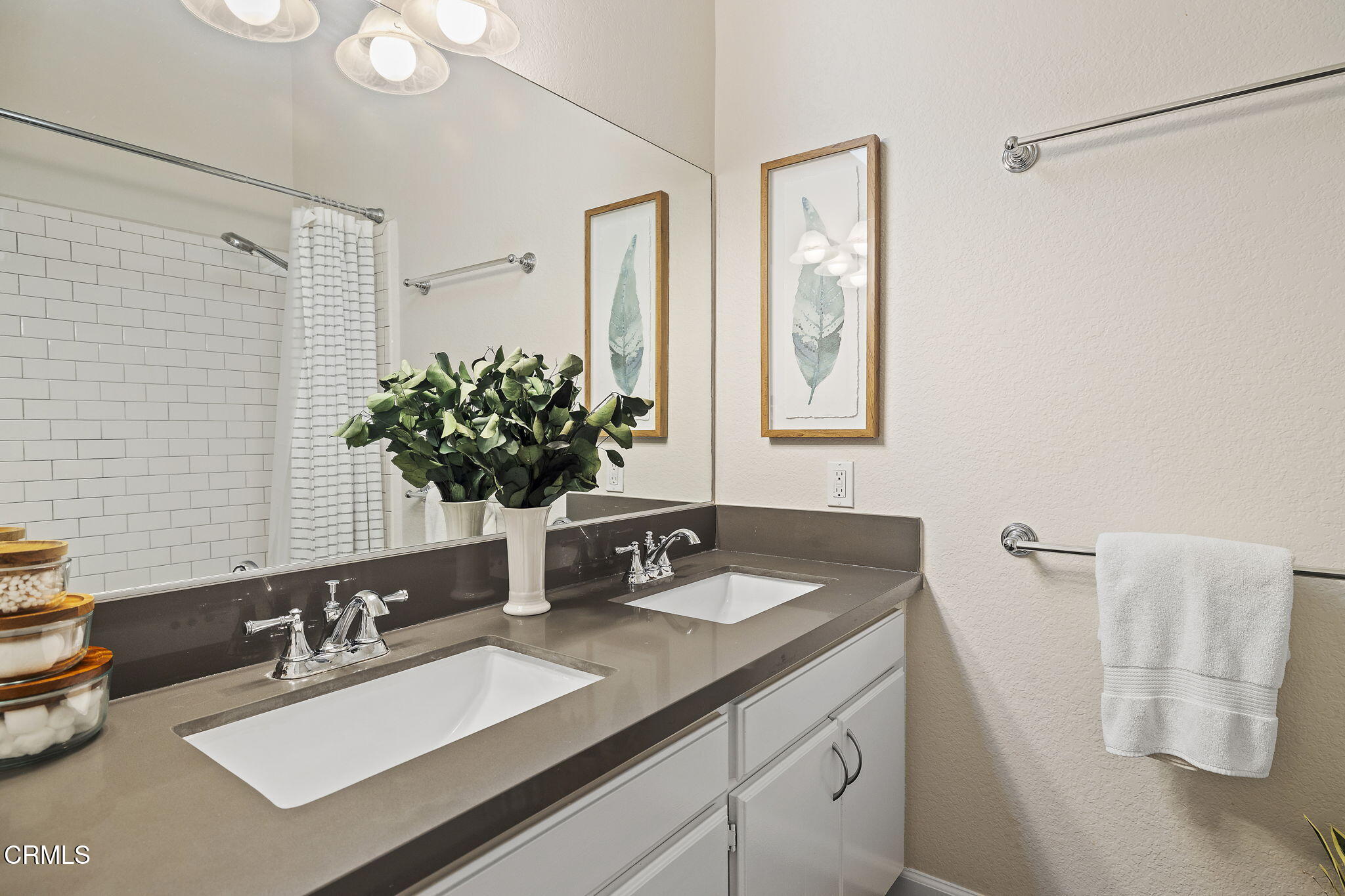 1052 Seco Street, Unit 206 Pasadena, CA 91103 - Photo 27 of 35 a bathroom with a sink and a mirror