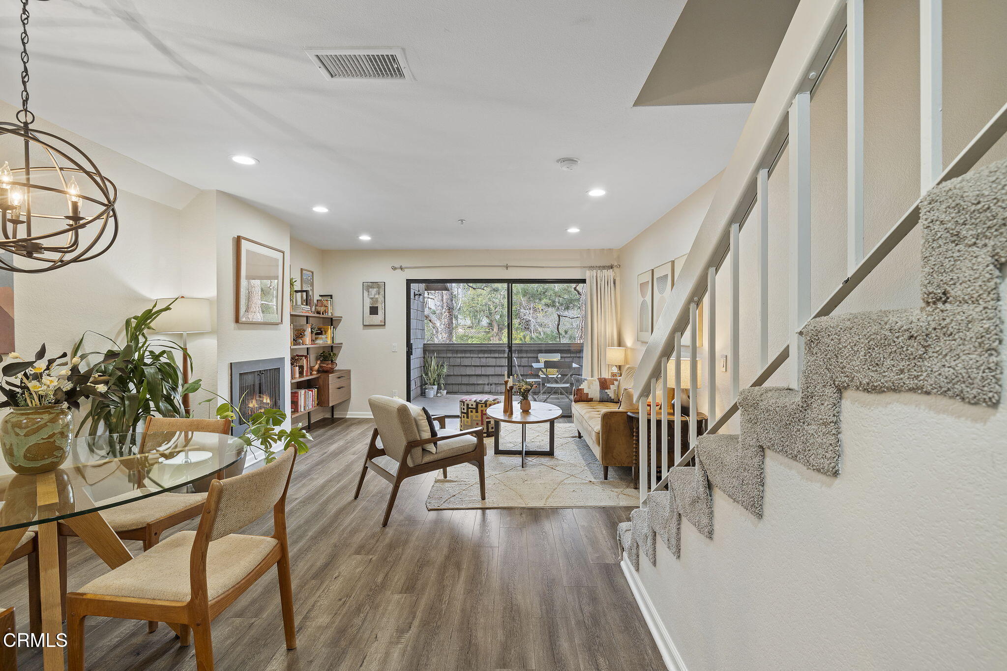 1052 Seco Street, Unit 206 Pasadena, CA 91103 - Photo 4 of 35 a view of a livingroom with furniture wooden floor and windows