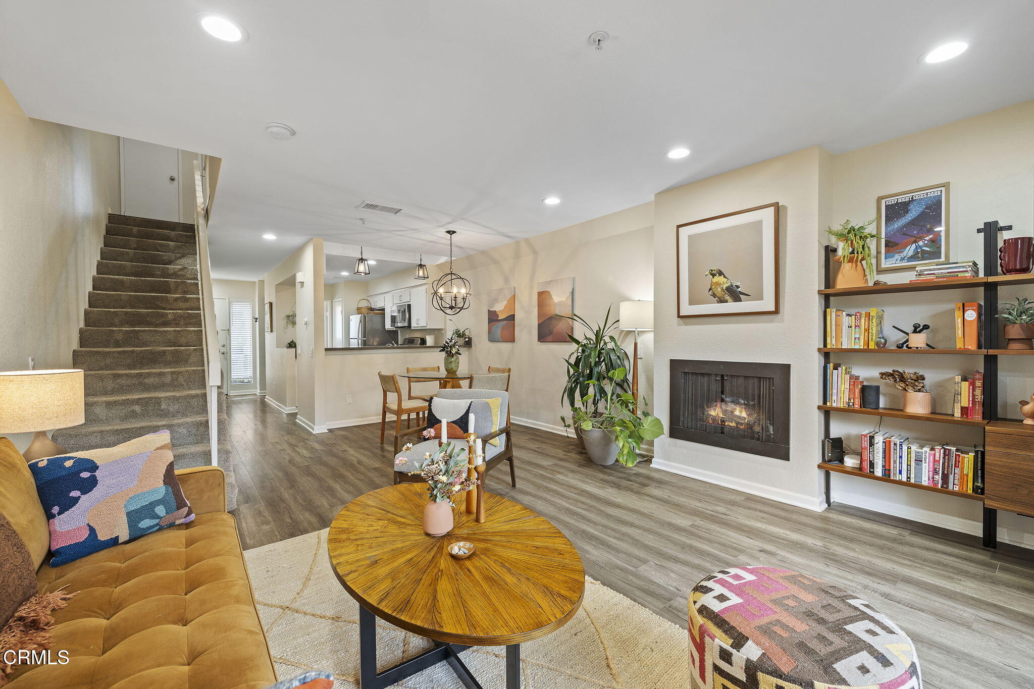 1052 Seco Street, Unit 206 Pasadena, CA 91103 - Photo 7 of 35 a living room with furniture and a fireplace