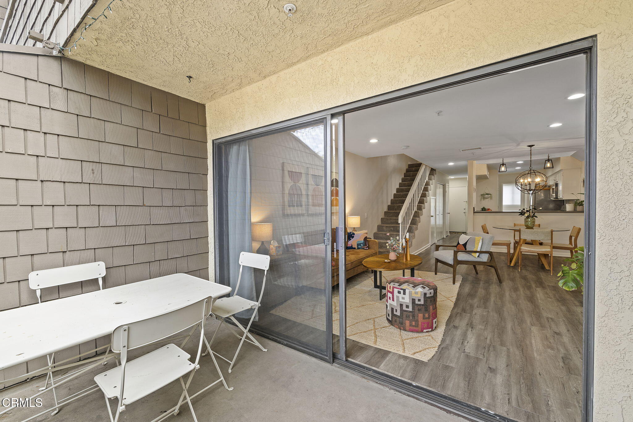 1052 Seco Street, Unit 206 Pasadena, CA 91103 - Photo 9 of 35 a dining room with furniture and a table