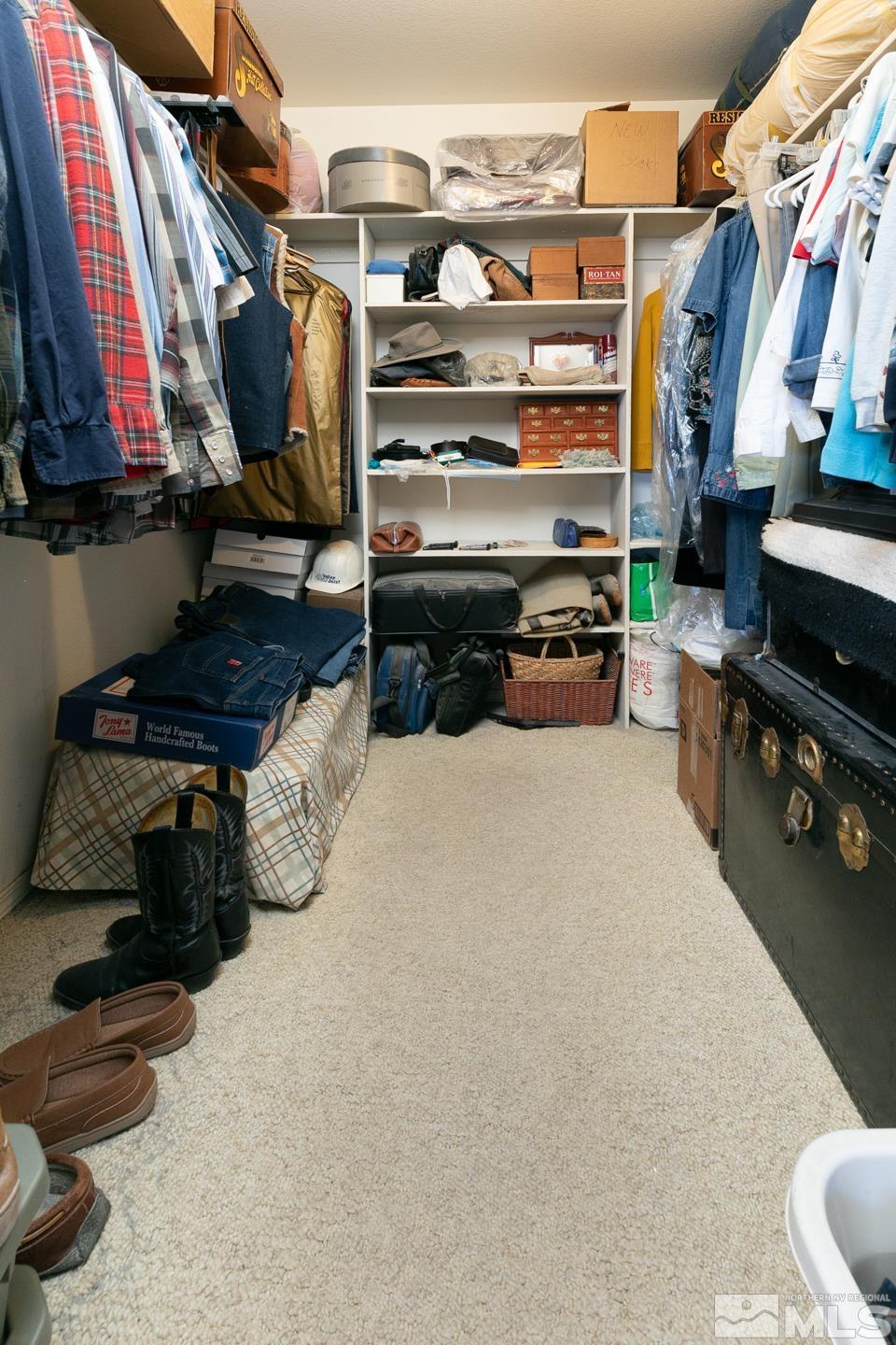 3812 Boyer Road Fallon, NV 89406 - Photo 15 of 40 a view of walk in closet with clothes and shoes