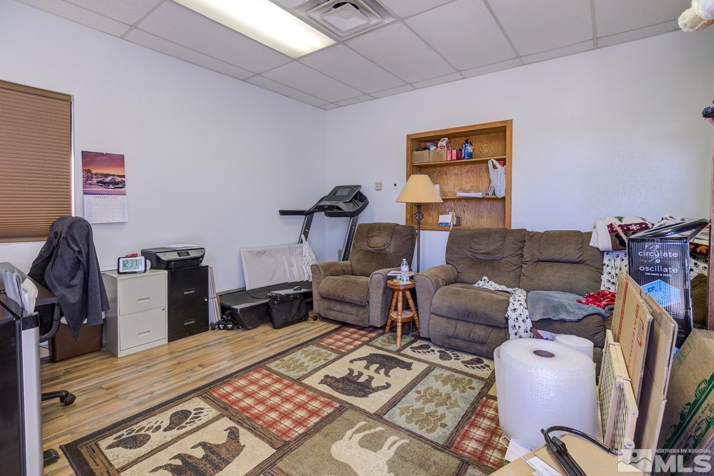 3812 Boyer Road Fallon, NV 89406 - Photo 21 of 40 a living room with furniture and a flat screen tv