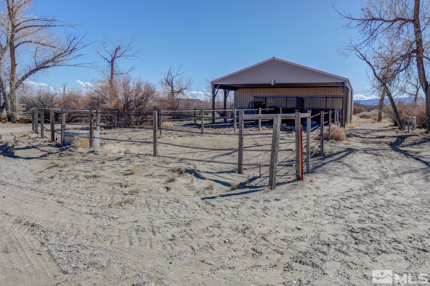 3812 Boyer Road Fallon, NV 89406 - Photo 28 of 40 a view of a house with a yard and sitting area