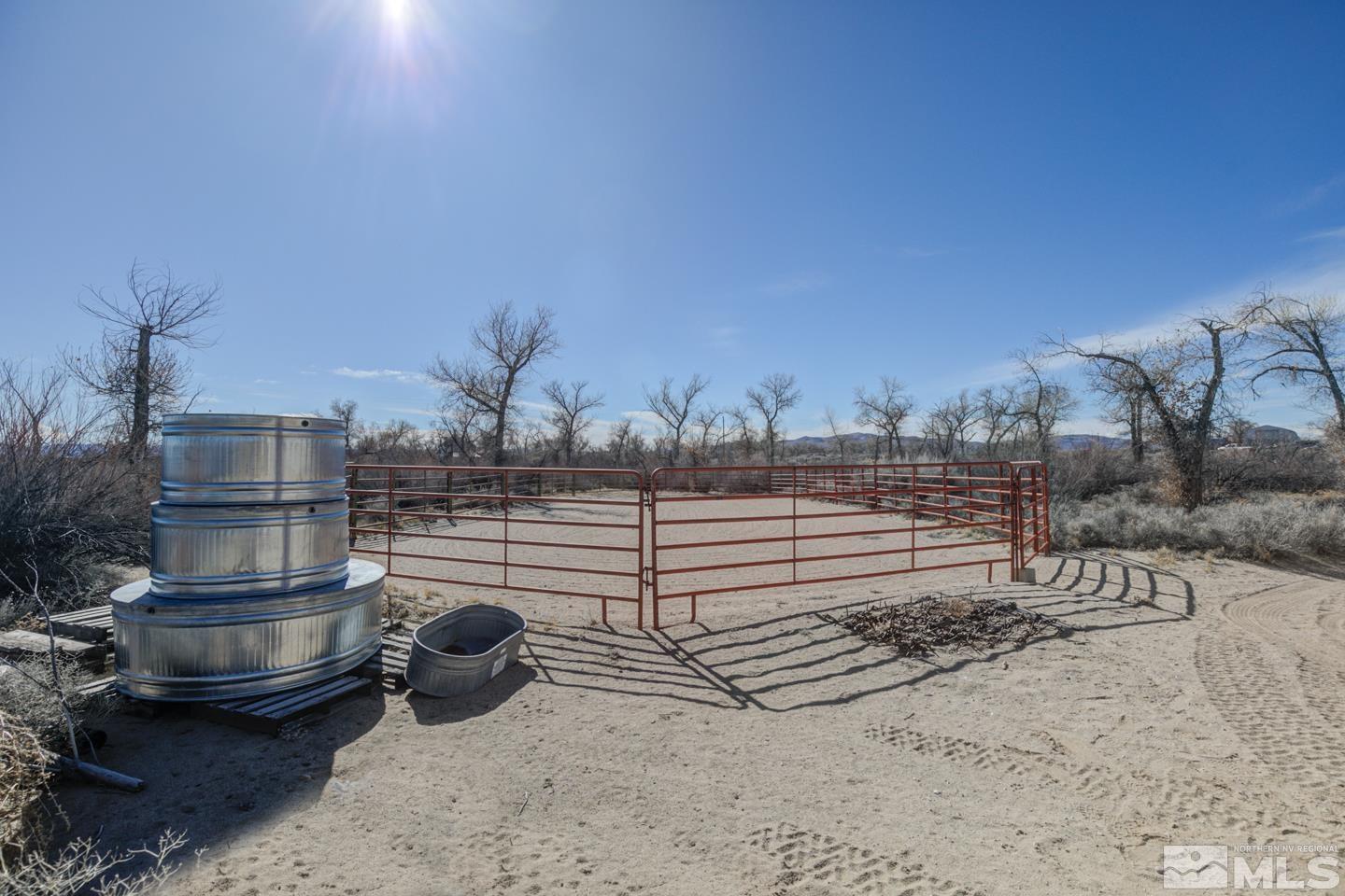 3812 Boyer Road Fallon, NV 89406 - Photo 31 of 40 a view of a backyard with a table and chairs