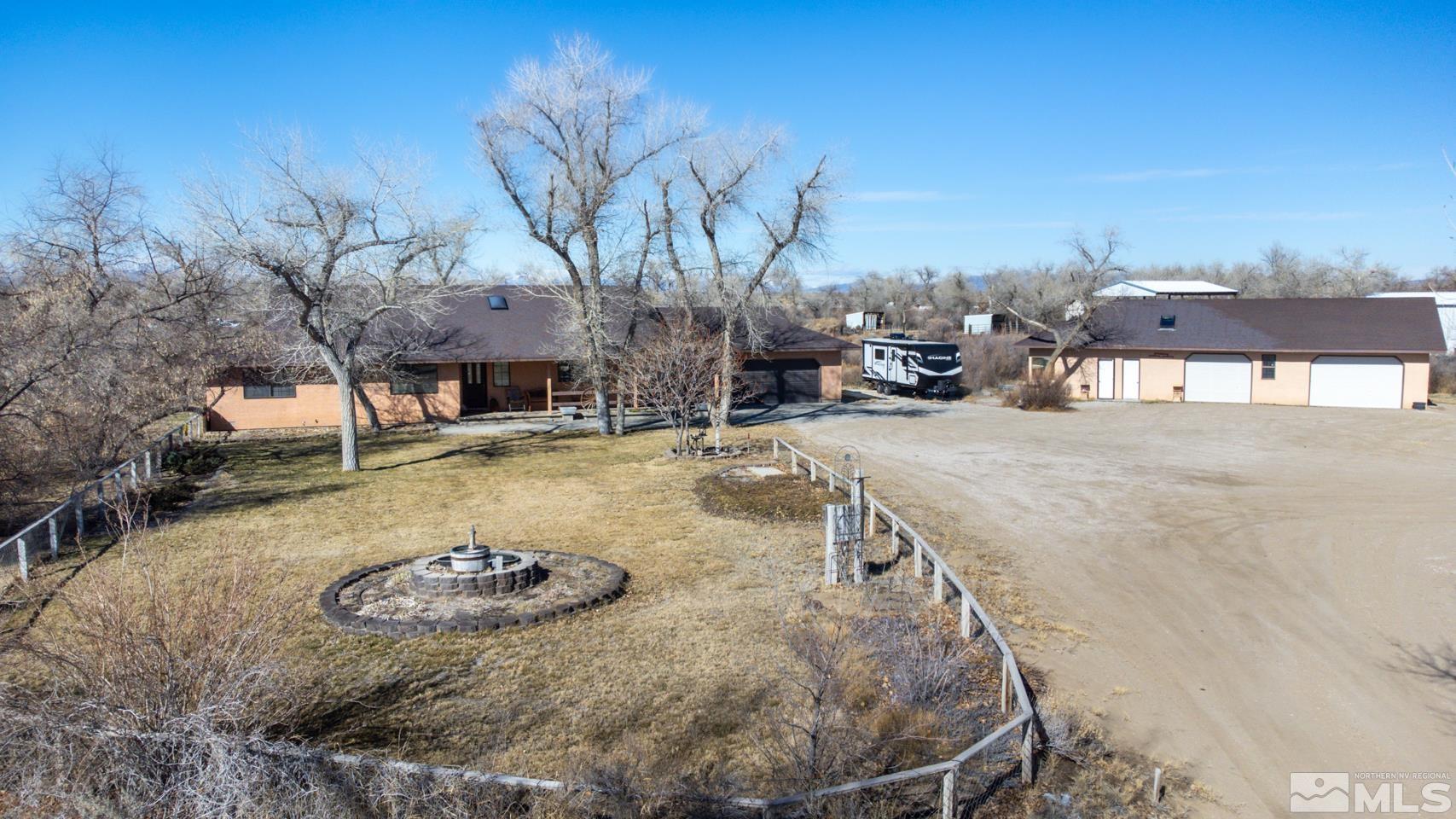 3812 Boyer Road Fallon, NV 89406 - Photo 35 of 40 a view of a swimming pool with an outdoor seating